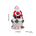Santa Claus sitting on the chimney resin ornament